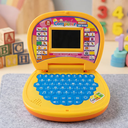 Kids educational laptop toy by Wukusy featuring colorful keys, numbers, alphabets, and music for early learning enjoyment.