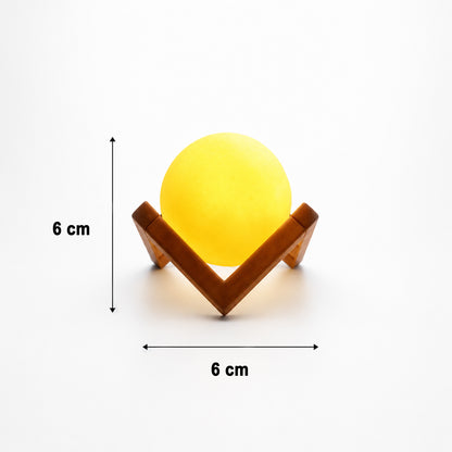 Wukusy LED ball night lamp with wooden stand, illuminated spherical light on a sleek wooden base for ambient bedroom lighting.
