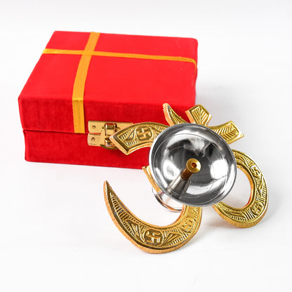 Brass Om symbol oil diya for home decor, featuring detailed craftsmanship and a traditional design by Wukusy.
