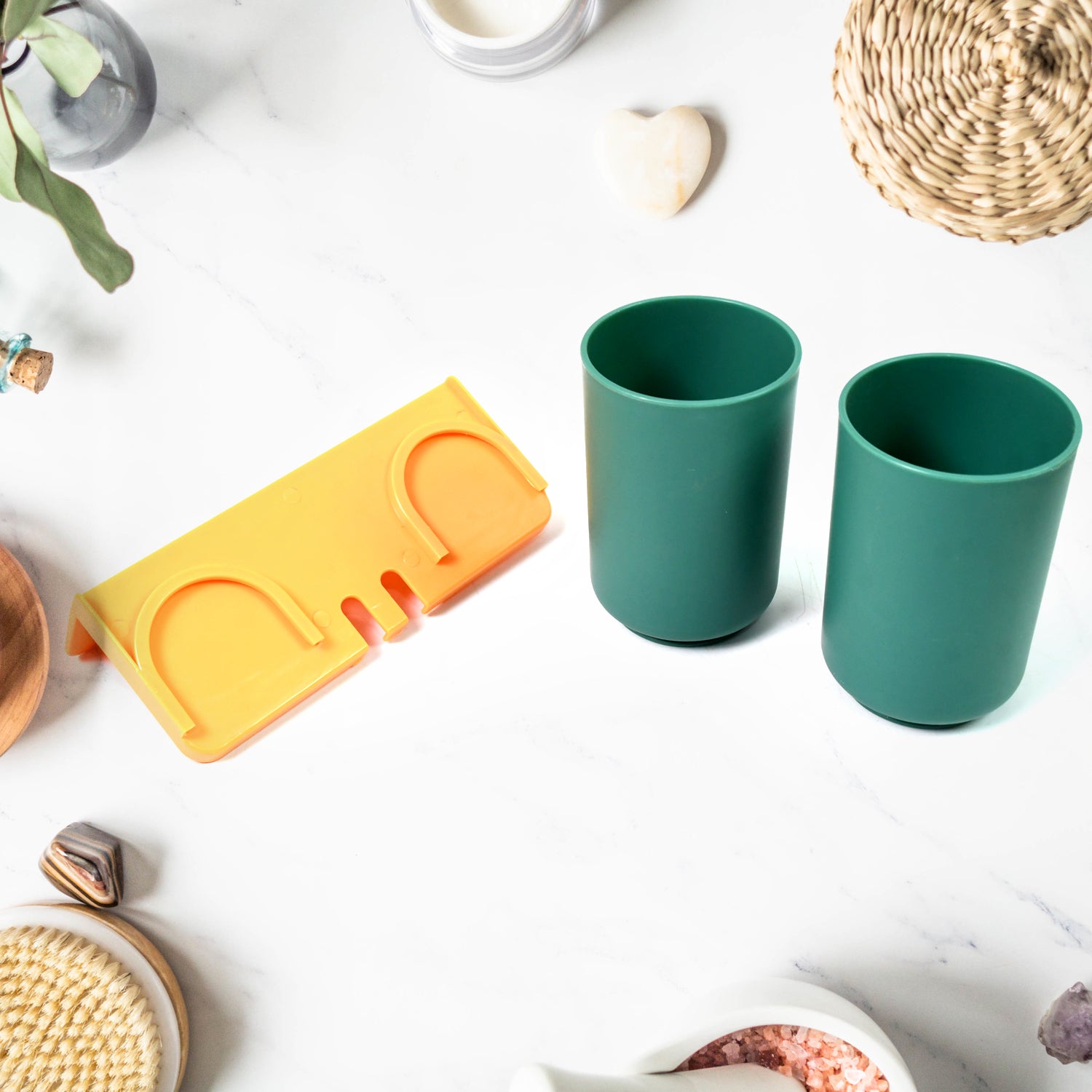 Wukusy multipurpose plastic wall mount toothbrush holder with two cups, suitable for bathroom organization and home improvement.