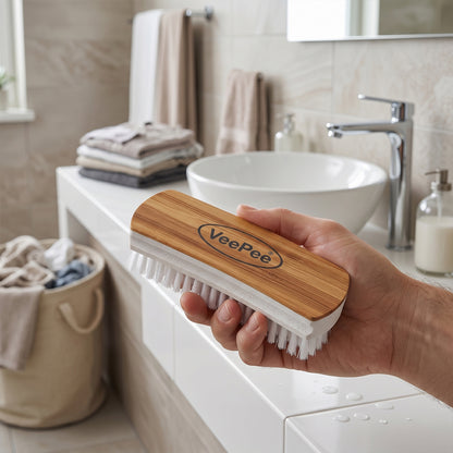 Wukusy Veepee heavy-duty cloth washing brush with wooden handle and sturdy bristles for cleaning clothes and fabrics.