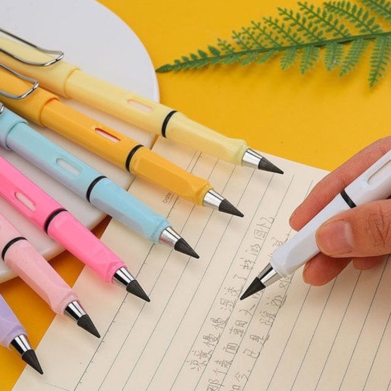 Wukusy 2-in-1 everlasting inkless pencil with replaceable head and eraser, portable and reusable for kids' art and stationery.