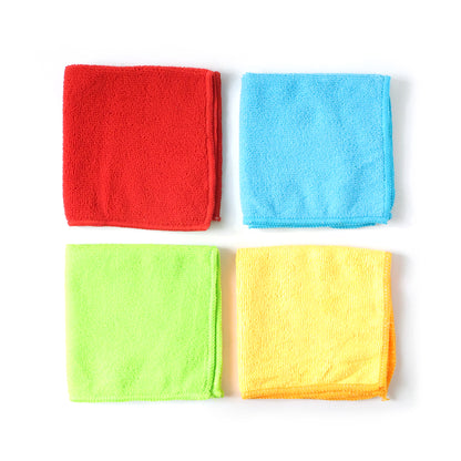 Set of four microfiber cleaning cloths by Wukusy, multi-purpose towels perfect for cleaning surfaces and glass.