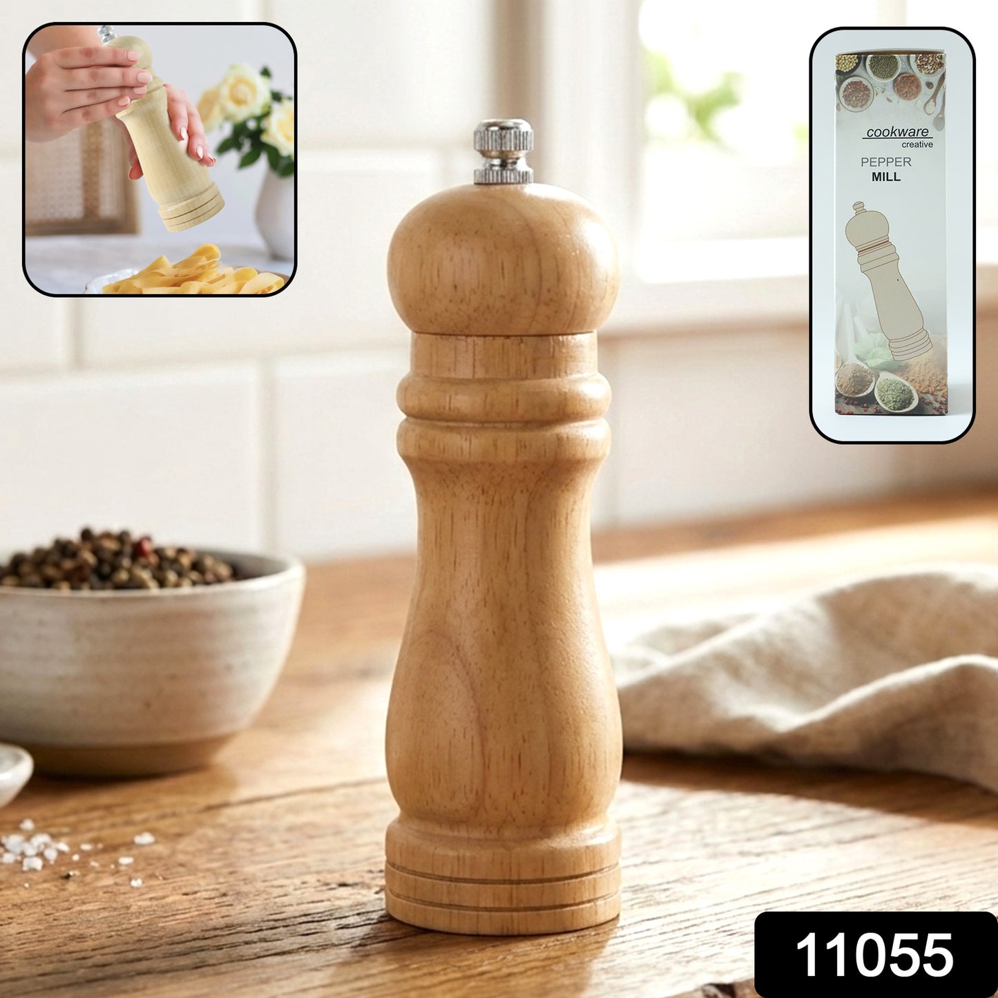 Wukusy classic wooden manual pepper grinding mill with a cylindrical shape and adjustable grind mechanism.