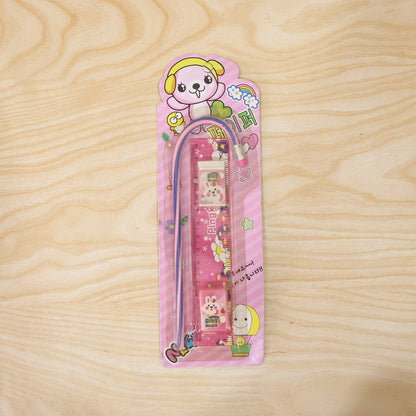 Pink Wukusy 4-in-1 stationery set with ruler, pencil, eraser, and sharpener on a white background.