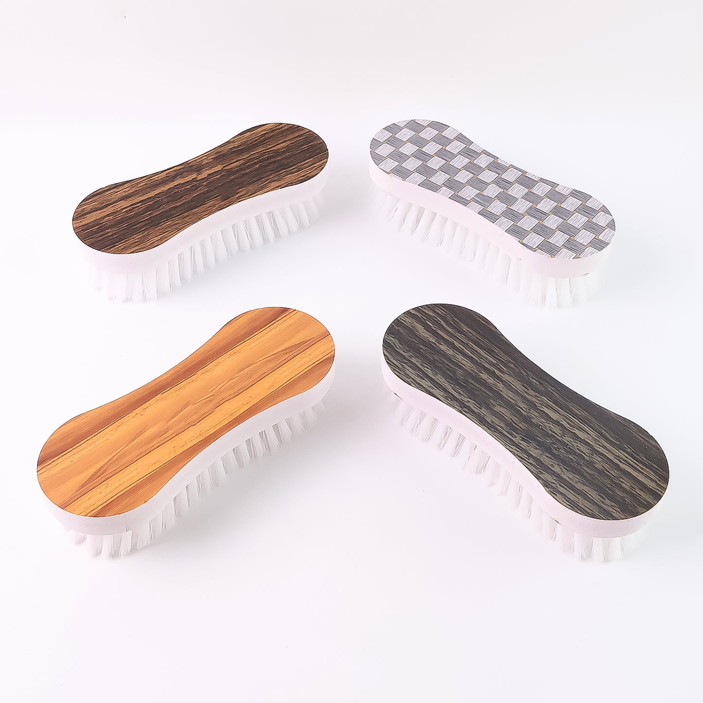 Wukusy ergonomic cloth washing brush set with four durable brushes for home cleaning and laundry tasks.
