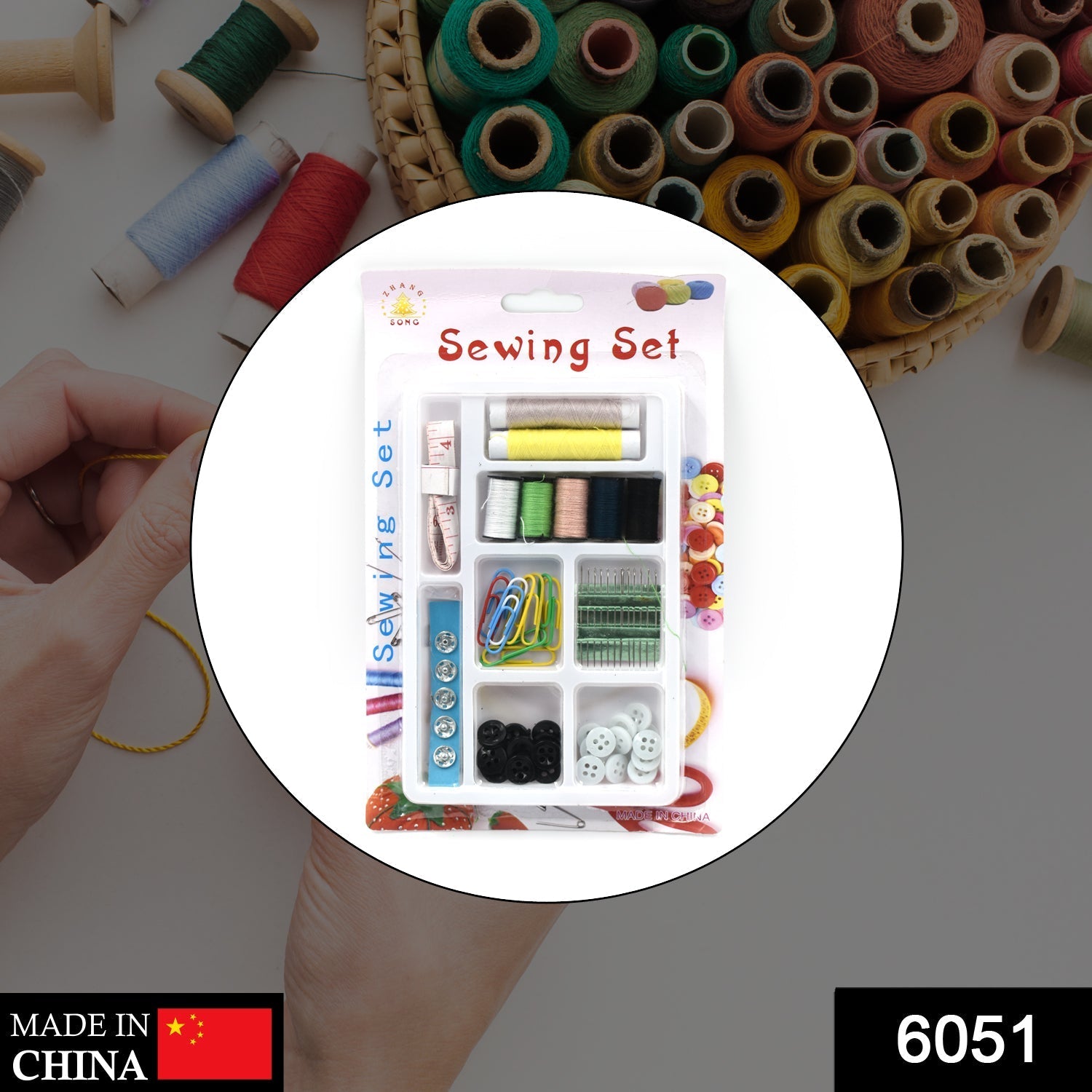 Wukusy 62-piece sewing set with needles, threads, and tools for clothes and fabric sewing projects on a white background.
