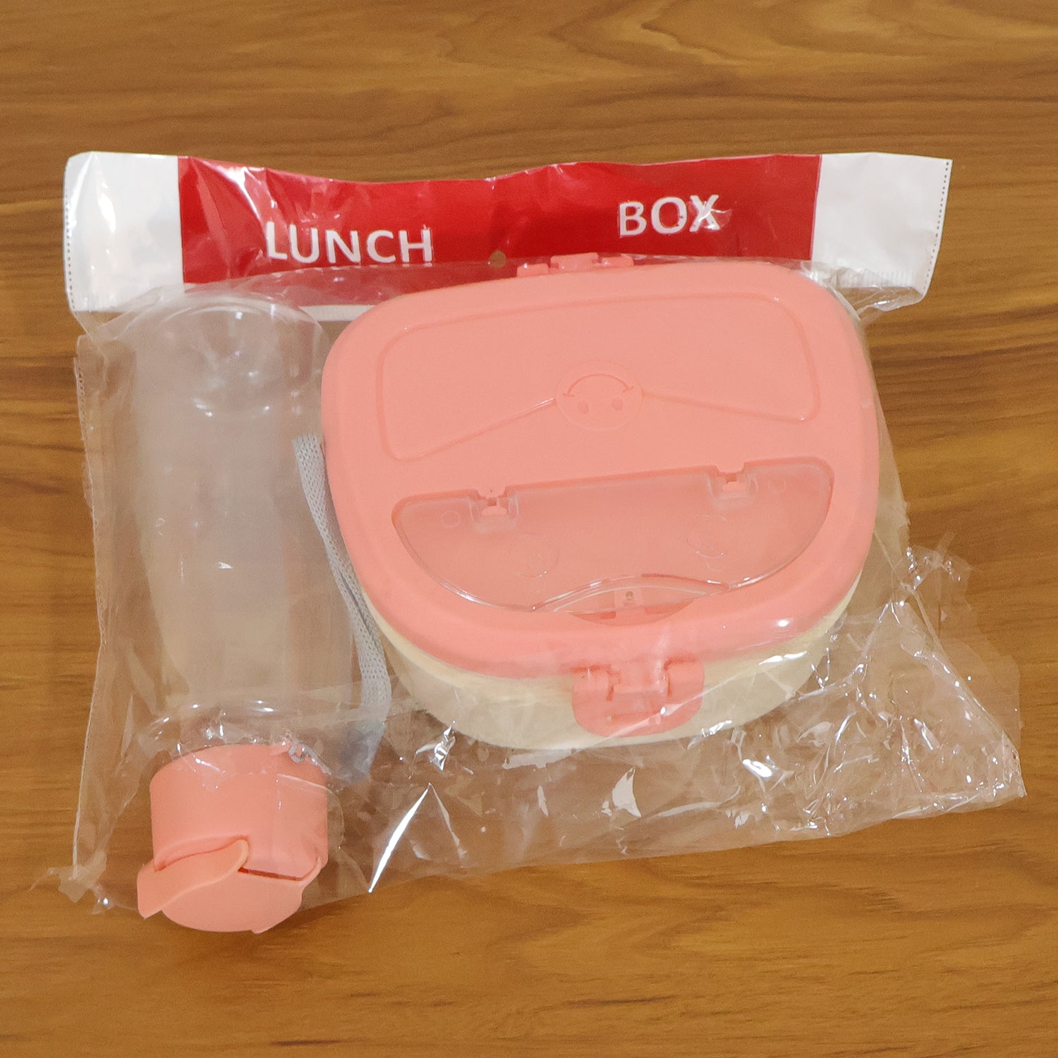 Wukusy plastic lunch box with water bottle combo set, featuring a durable container and matching water bottle for kids.