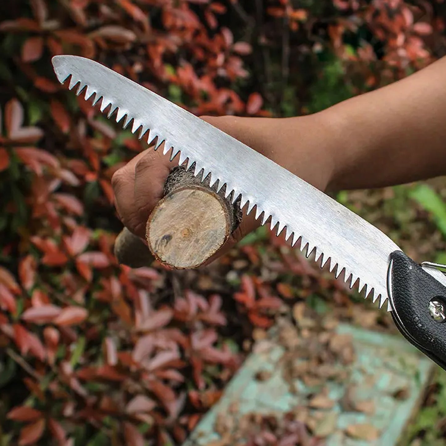Wukusy 1793 folding handsaw for pruning, gardening, camping, and hunting, with a sharp blade for cutting wood, PVC, and bone.