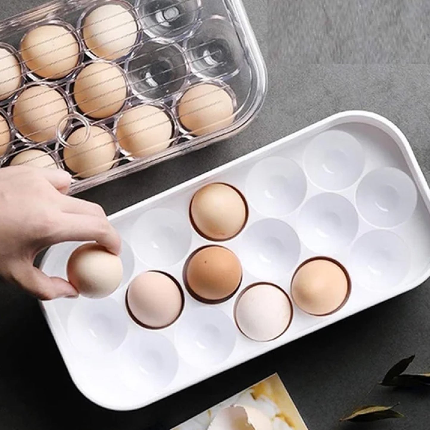 Wukusy 12-cavity egg storage box for keeping eggs organized and secure in the kitchen, made of durable plastic.
