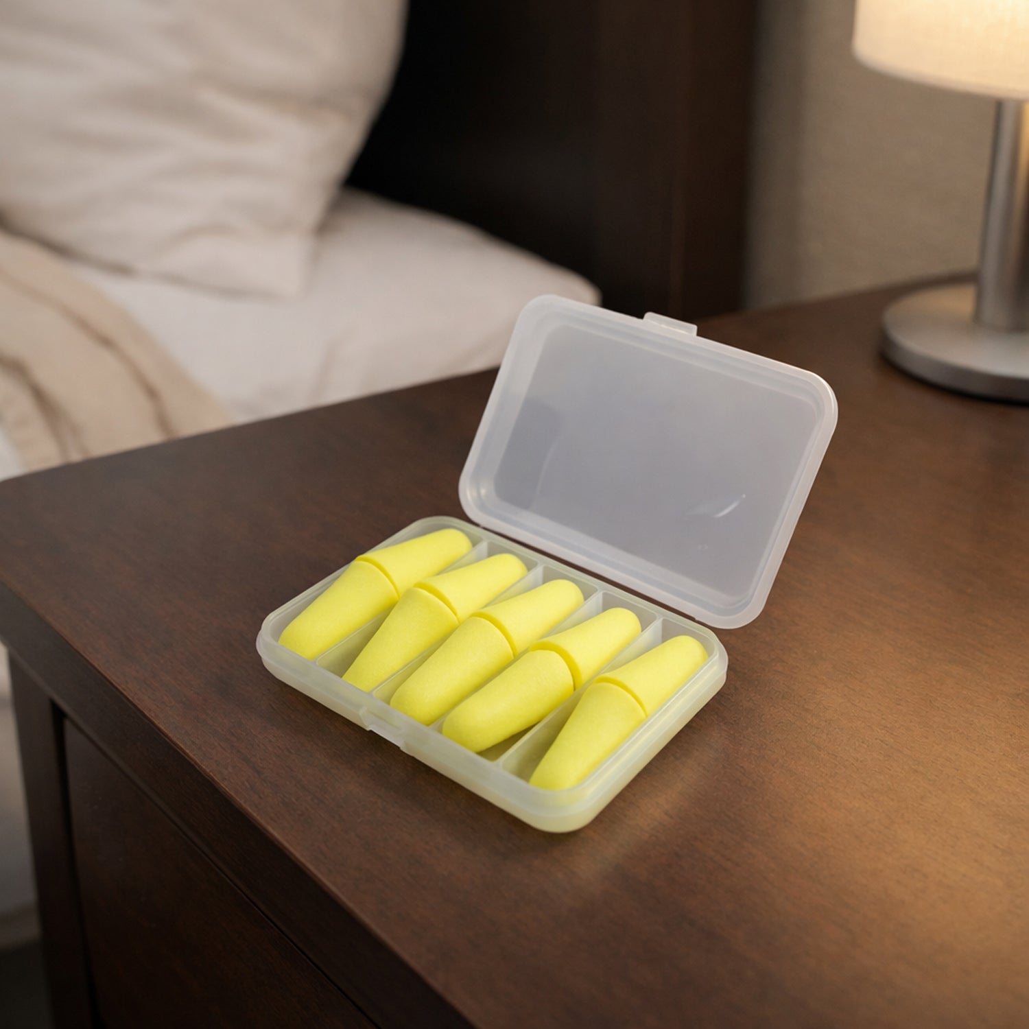 Wukusy soft foam noise reduction ear plugs in a 5-pair pack, shown inserted in ears for hearing protection and noise cancellation.
