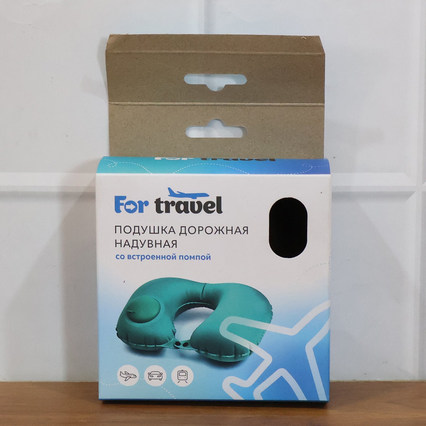 Wukusy inflatable travel neck pillow in gray, showing its ergonomic shape designed for comfortable support during flights.