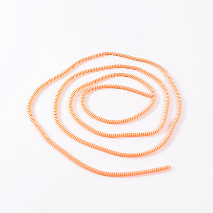 Flexible spiral cable protector sleeve for mobile accessories by Wukusy, showing coiled black protective sleeve for cables.
