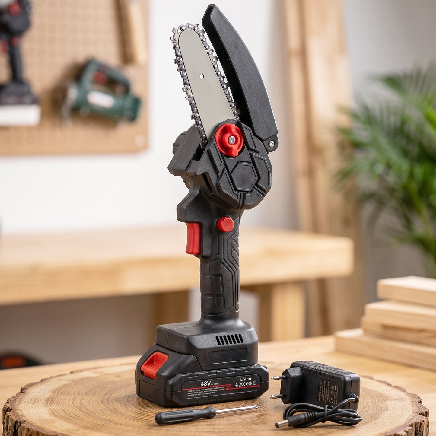 Wukusy mini electric cordless chainsaw with 48V battery showing a compact wood cutting tool with battery and chain in a natural setting