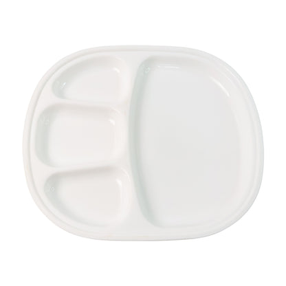Wukusy plastic large compartment dinner plate with four sections, ideal for serving diverse food portions in a home kitchen setting.