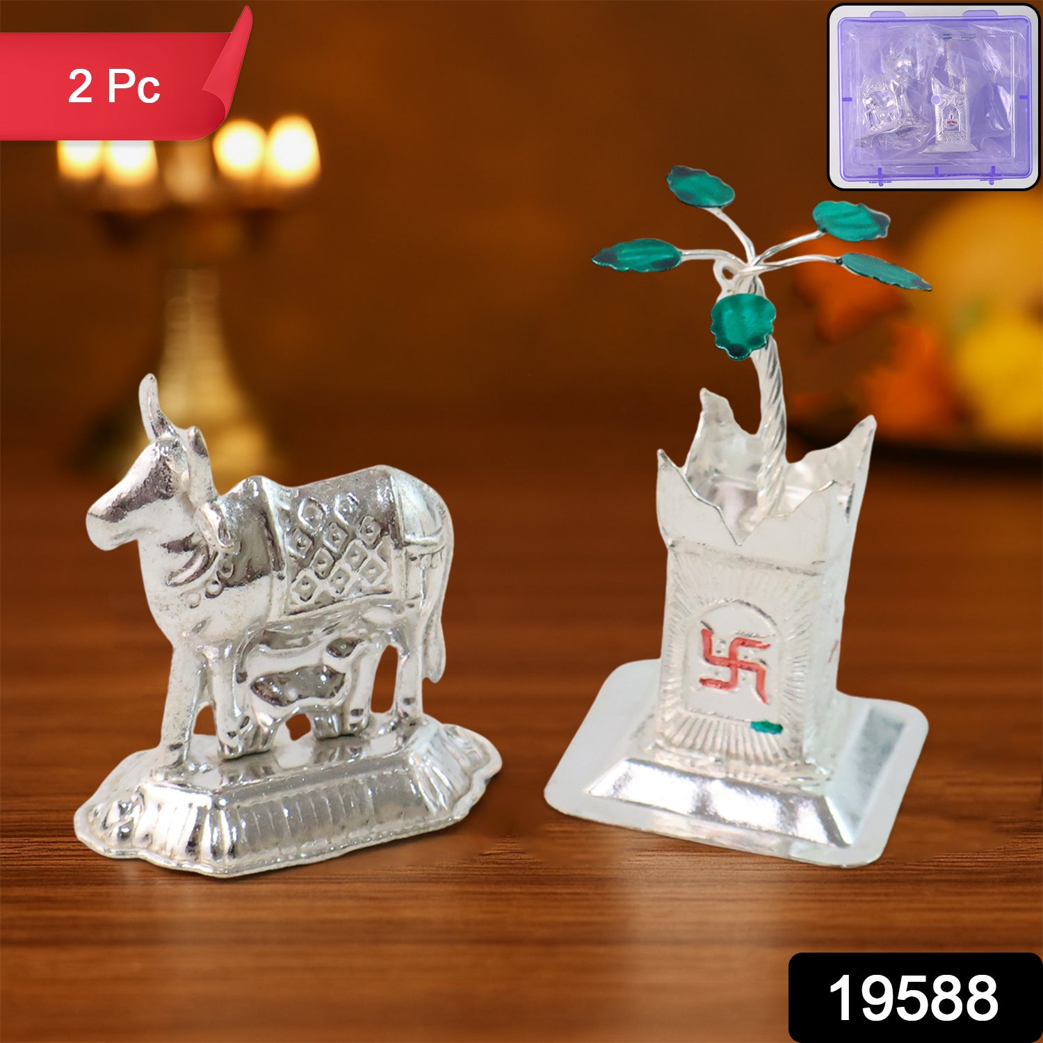 Silver-plated Kamdhenu Cow and Tulsi plant pair for pooja and home decor, displayed on a decorative stand.
