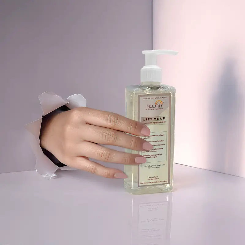 Nourix Lift Me Up Face Wash by 11012, a beauty product for youthful, glowing skin, shown in a clear pump bottle.