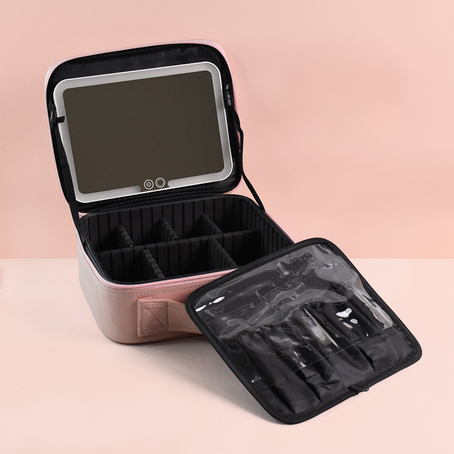 Pink Wukusy LED light makeup organizer box with multiple compartments for cosmetics and brushes, illuminated with built-in LED lights.