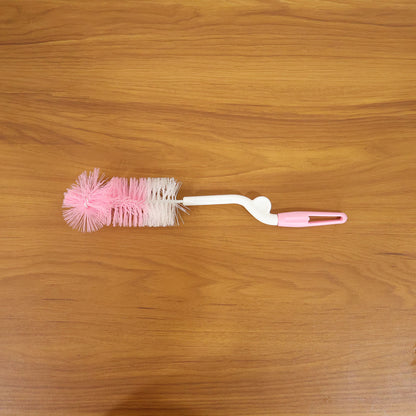 Wukusy bottle nipple cleaning brush with 360 rotary handle, designed for thorough cleaning of baby bottles and nipples.