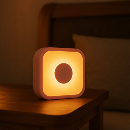 Wukusy USB-powered touch sensor LED night lamp illuminating a bedside table in a modern home.
