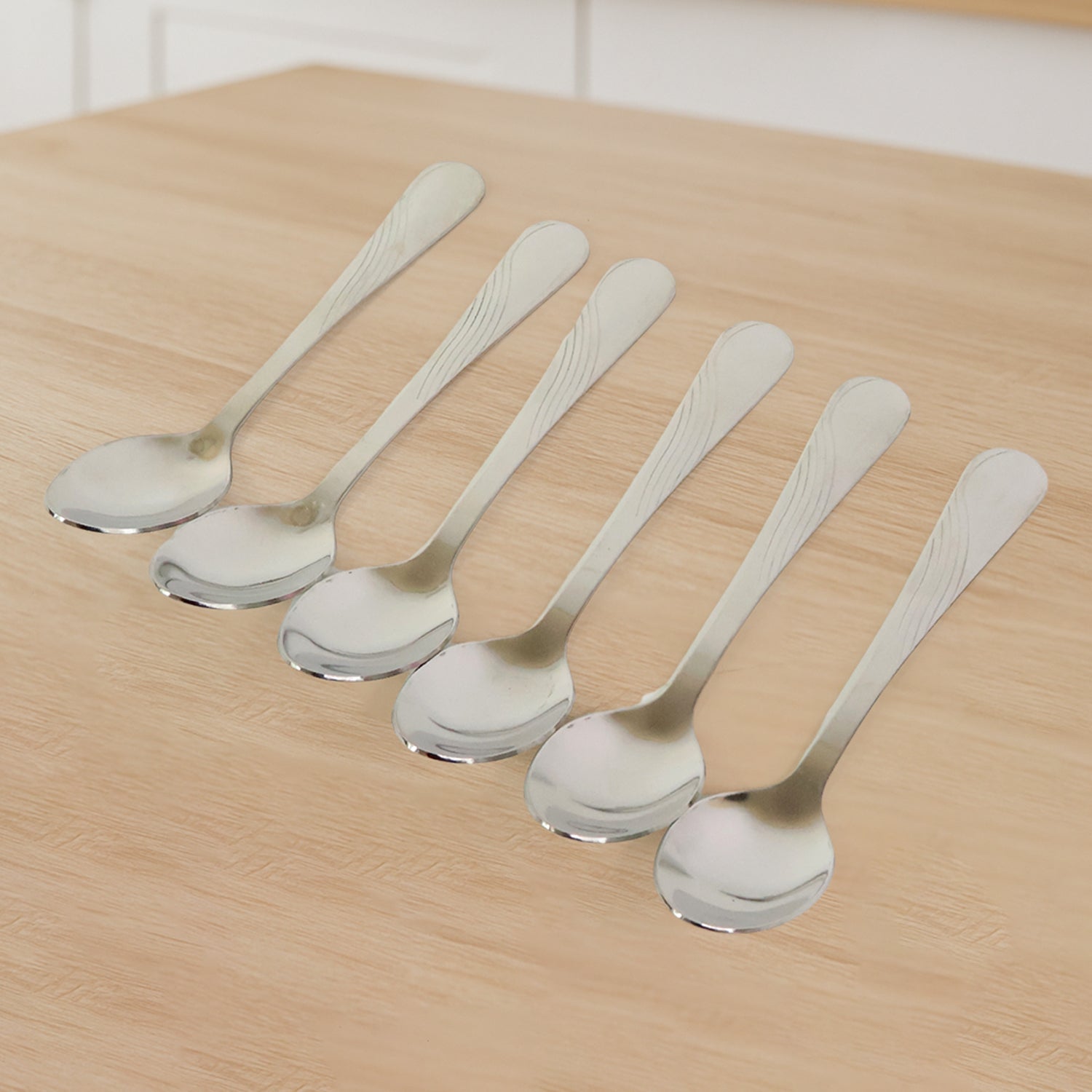 Set of six Wukusy Supermom Diamond stainless steel dining spoons with a sleek, modern design for home and kitchen use.