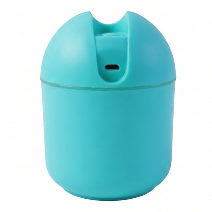 Wukusy portable USB mini air humidifier with cool mist, compact device emitting visible mist in a modern design