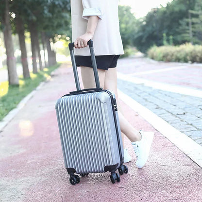 Set of two Wukusy travel trolley bags, large and small suitcases for men and women, with sturdy wheels and durable design.