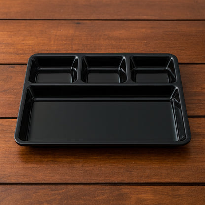 Wukusy plastic 4-compartment rectangular meal serving tray with sections for organized dining, shown in the image.