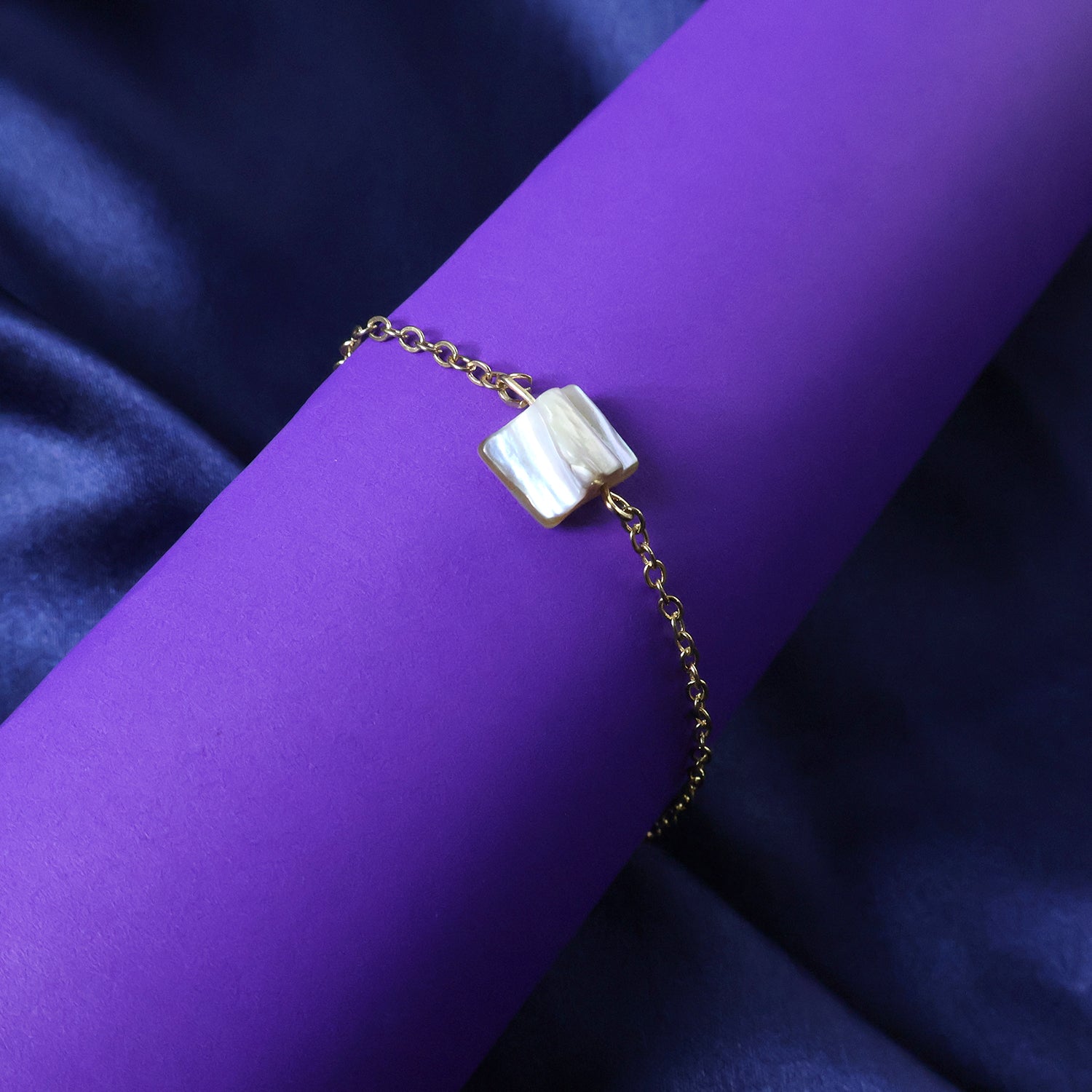 Elegant adjustable chain bracelet by Wukusy with mixed design, featuring intricate links and a polished finish.