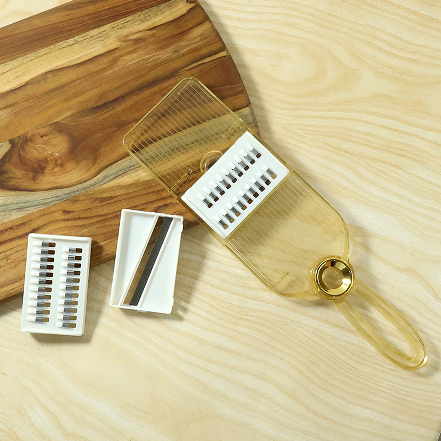 Wukusy multifunctional vegetable cutter set with interchangeable blades, shown with various slicing and dicing attachments.