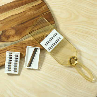 Wukusy multifunctional vegetable cutter set with interchangeable blades, shown with various slicing and dicing attachments.
