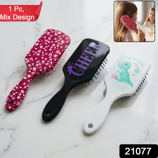 Colorful Wukusy kids hair brush with fun design, featuring soft bristles and ergonomic handle for gentle hair detangling.