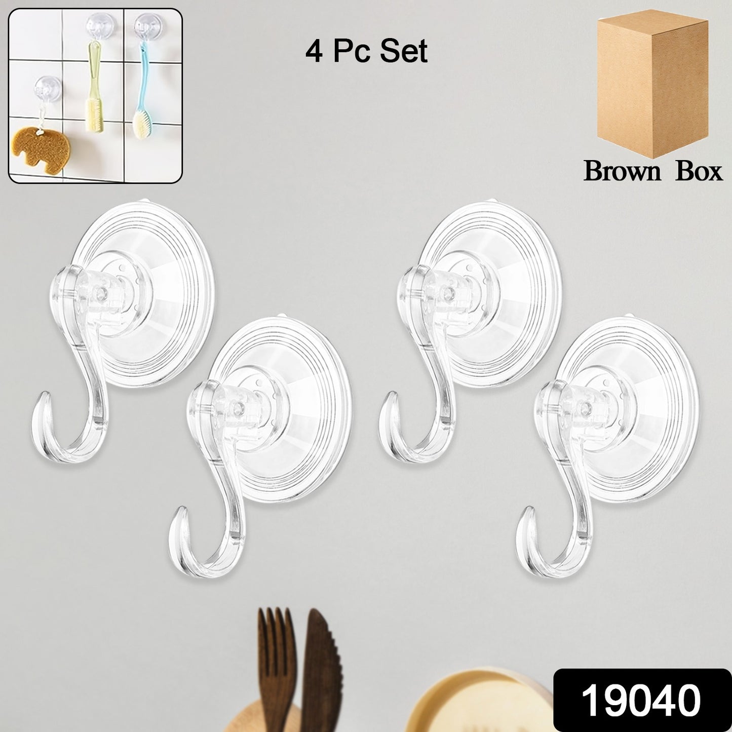 Set of four Wukusy plastic suction cup hooks attached to a smooth surface, showing their round shape and secure grip.