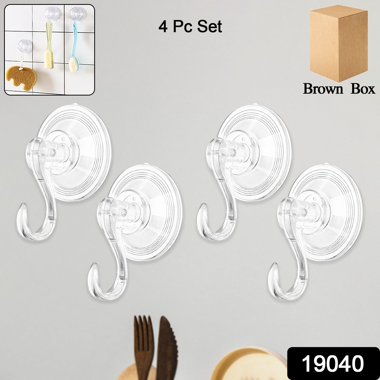 Set of four Wukusy plastic suction cup hooks attached to a smooth surface, showing their round shape and secure grip.