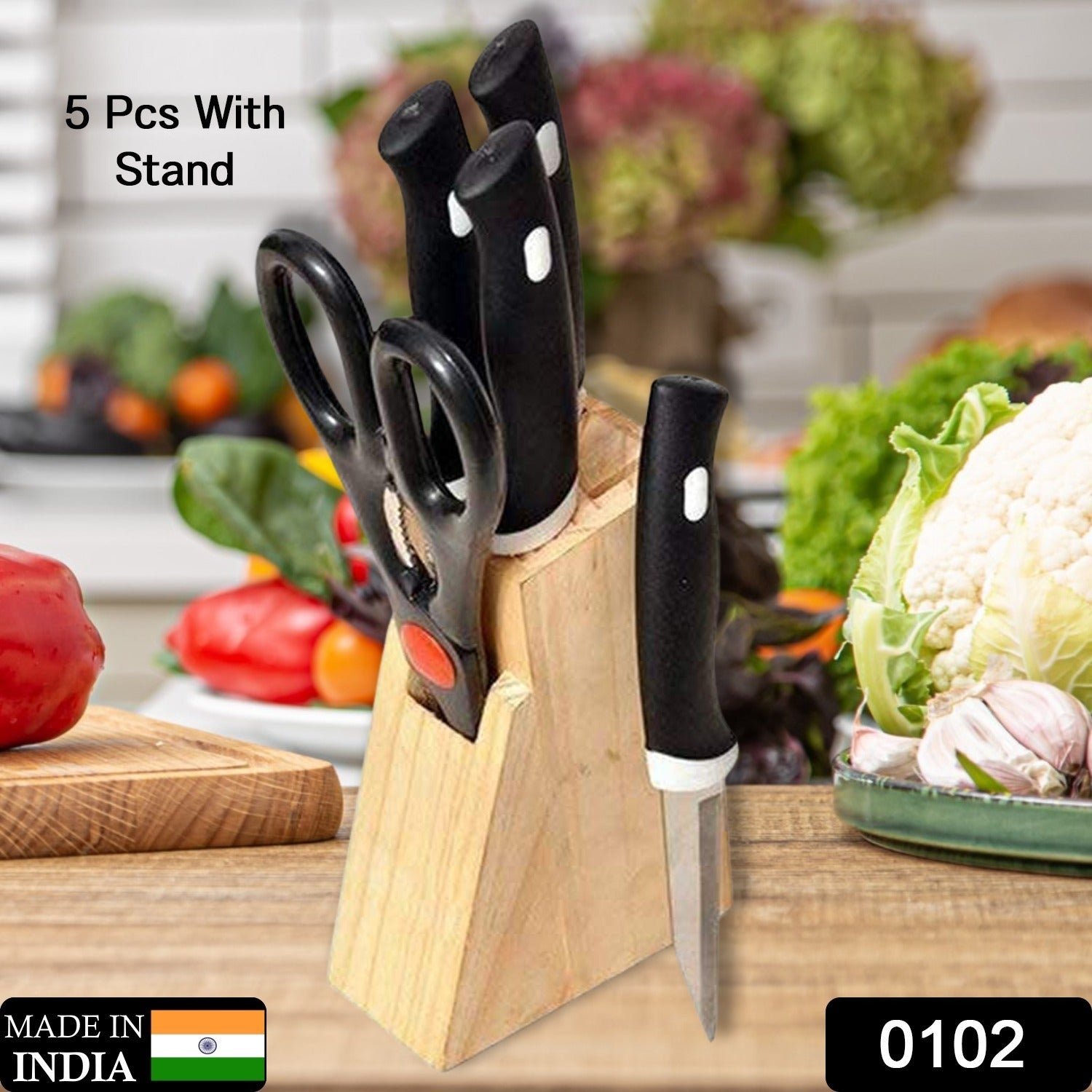 Wukusy 5-piece black kitchen knife set with wooden block and scissors, displayed on a countertop in a modern kitchen.