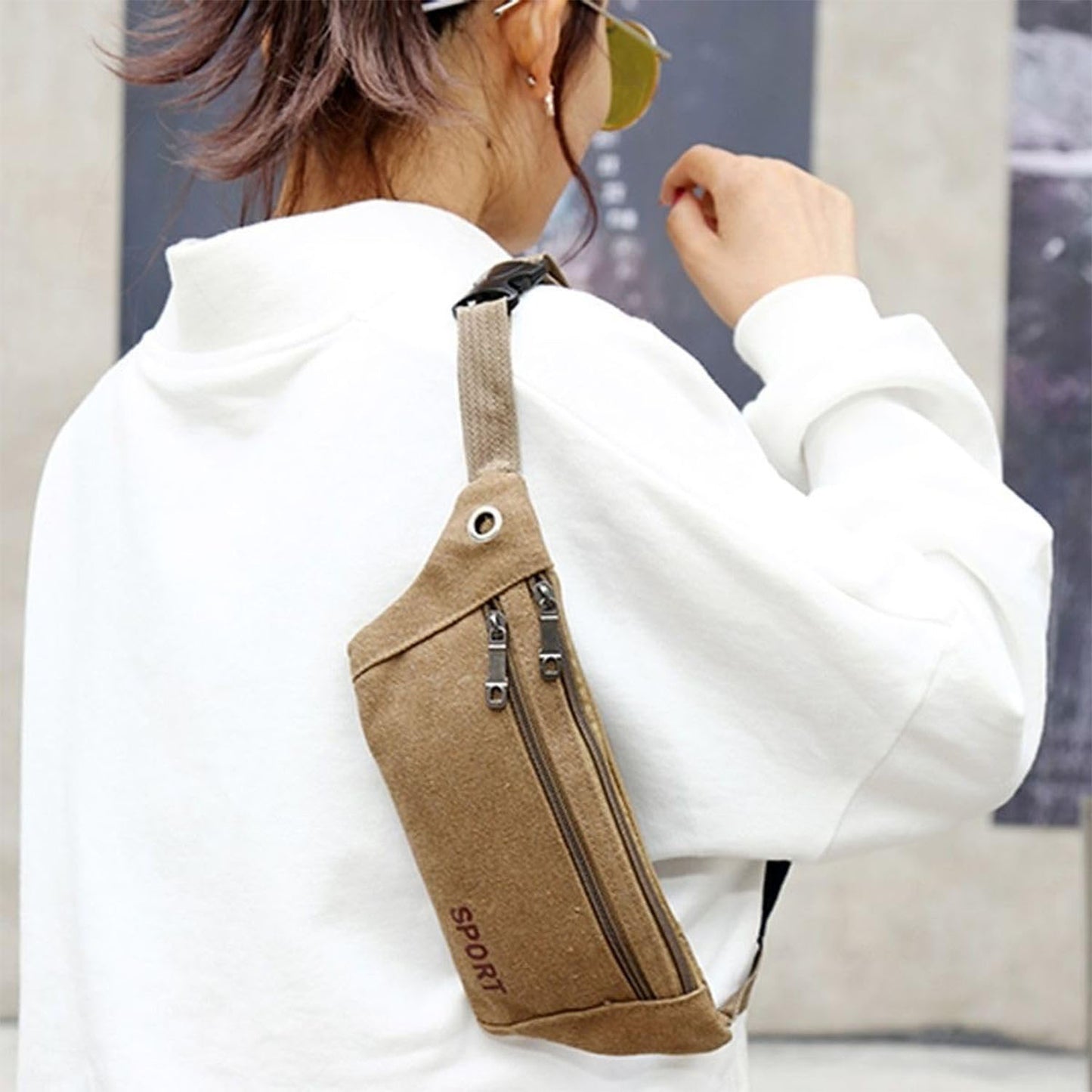 Wukusy multipurpose canvas waist pouch sling bag with adjustable strap and multiple compartments, suitable for travel and daily use.