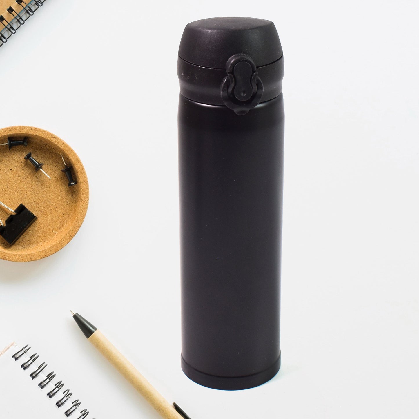 Colorful Wukusy insulated stainless steel water bottle for kids, 500ml capacity, with a mix of vibrant colors.