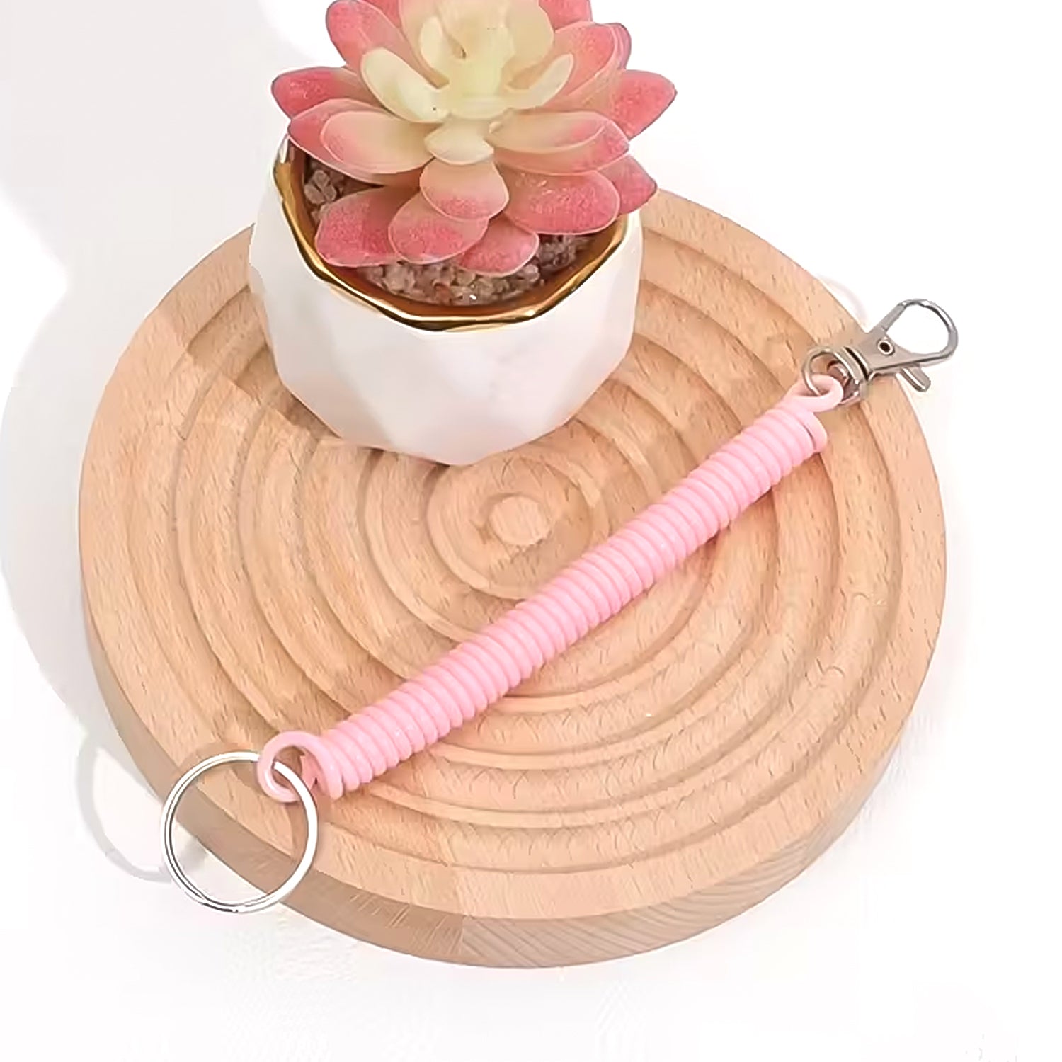 Wukusy elastic spiral coil keychain bracelet with metal key ring and clip hook, flexible and stylish accessory for keys or bags.
