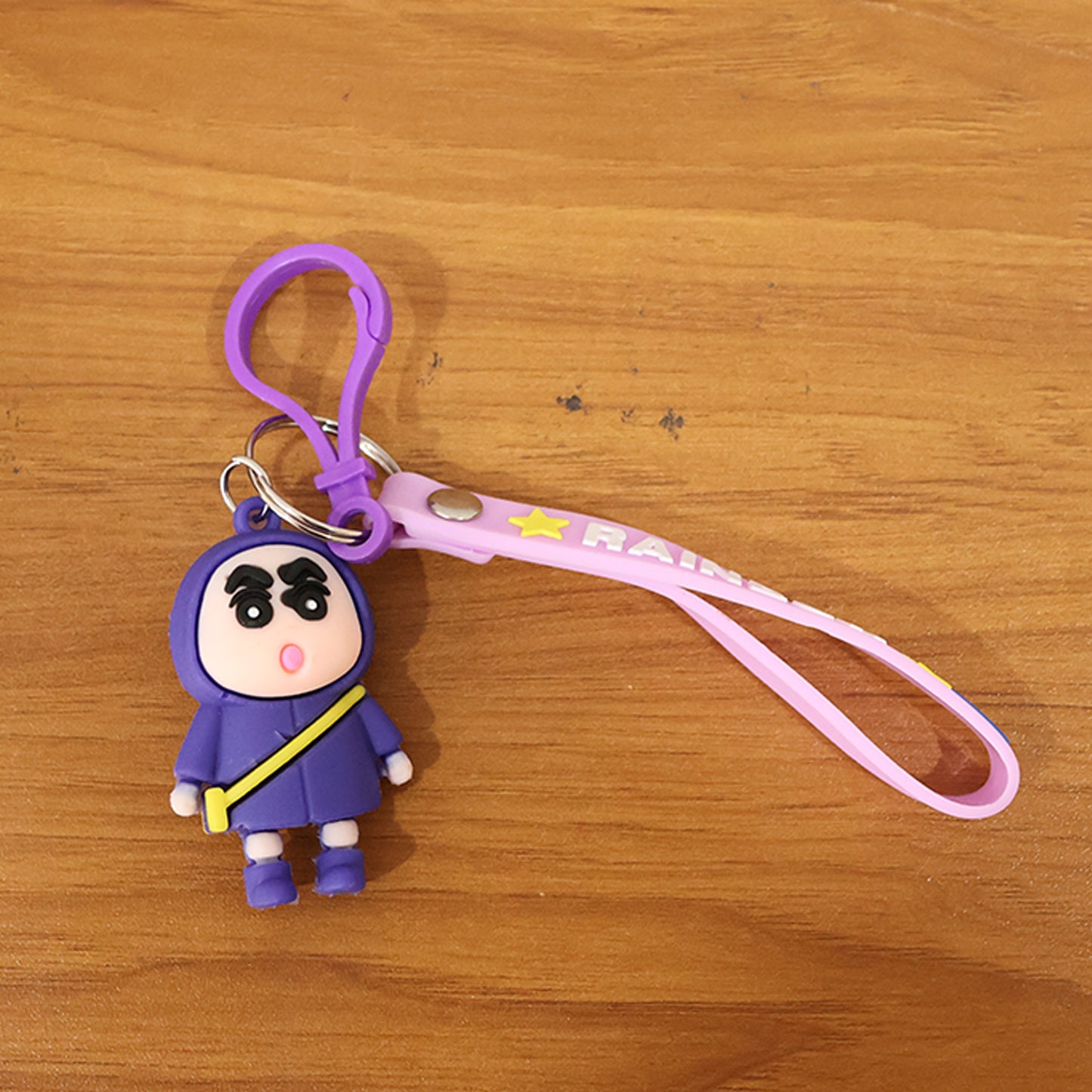Cute cartoon character silicone keychain by Wukusy featuring a colorful, playful design on a keyring.
