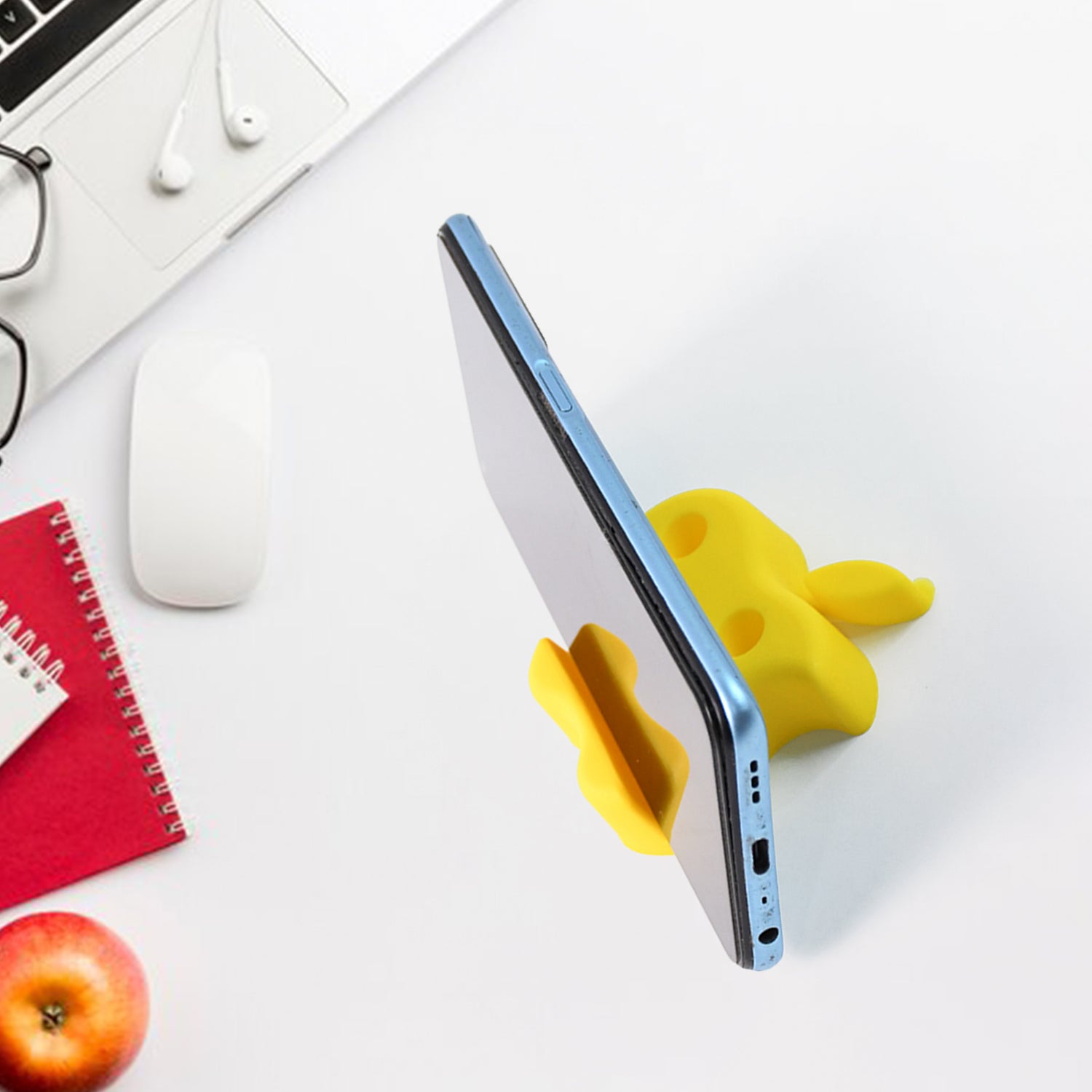 Colorful Wukusy Apple-shaped plastic mobile stand with built-in pen holder, featuring a sleek, multi-functional design.
