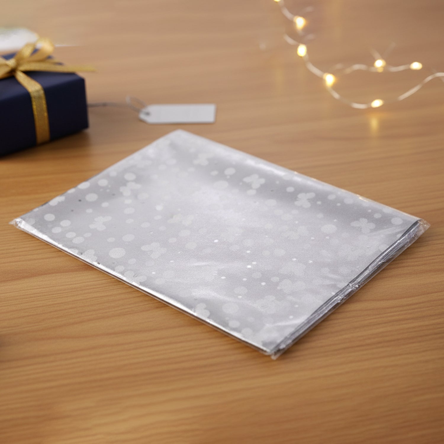 Decorative silver gift wrapping paper sheets by Wukusy, pack of approximately 20 glossy silver sheets for gift wrapping and crafts.