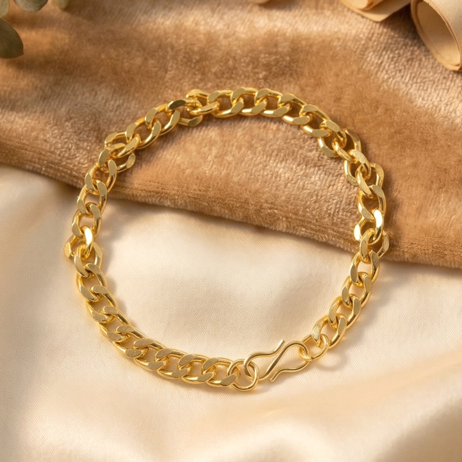 Gold finish chain link bracelet by Wukusy, unisex jewelry with classic design, shown on a white background.