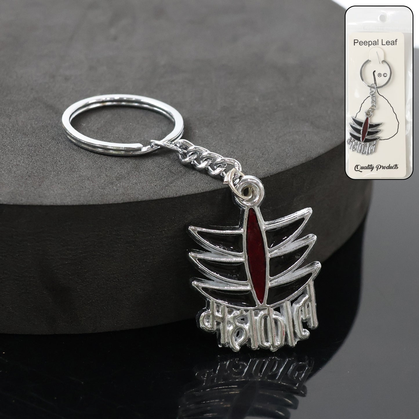 Metal Mahakal symbol keychain by Wukusy, featuring detailed design on a small, durable keychain accessory.