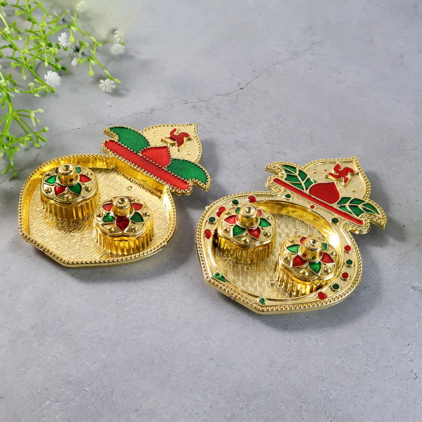 Decorative plastic Kalash-shaped double Kumkum box in mix design, suitable for home and kitchen decor by Wukusy.