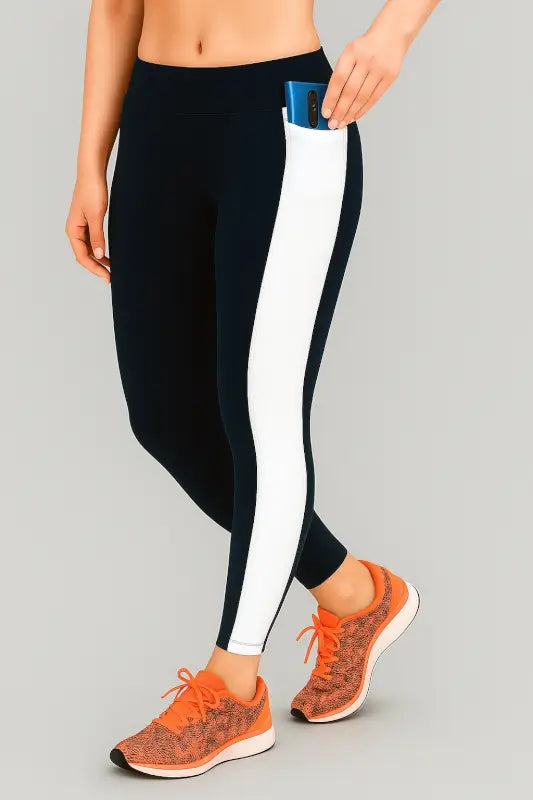 Ekom women's stretchable yoga pants in black, designed for comfort and flexibility during gym workouts or daily activities.