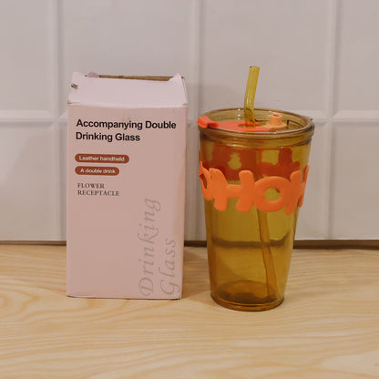 Clear glass tumbler with lid and straw, 450ml capacity, by Wukusy, showing the transparent design and included straw in the image.