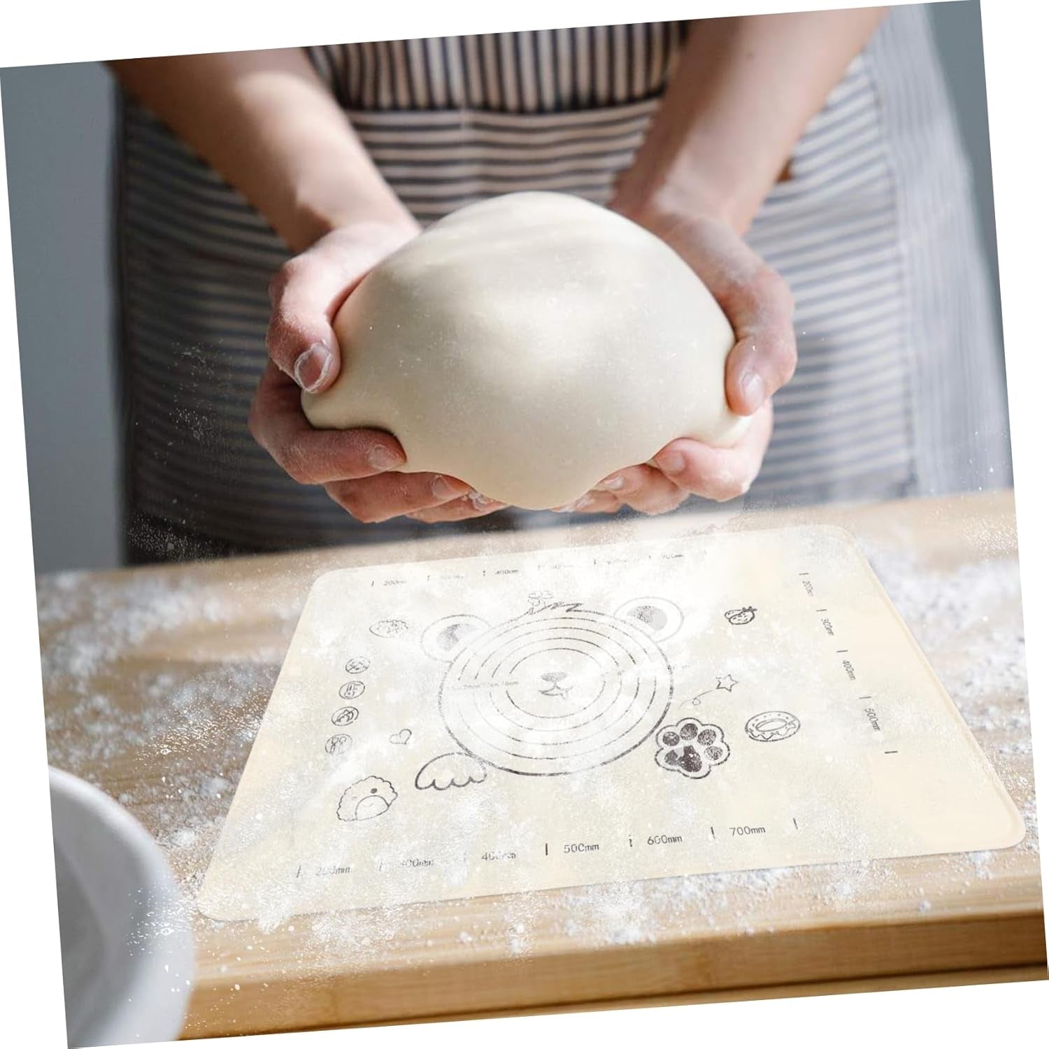 Wukusy 3-in-1 low silicone baking mat set with wooden belan and cake scraper, ideal for rolling and decorating baked goods.