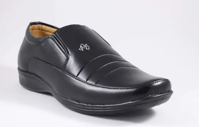 Black men's formal moccasin shoes by ekom, stylish office shoes for men and boys, designed for comfort and elegance.