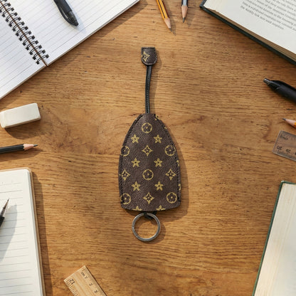 Wukusy premium designer-style keyholder and key case with multiple key rings, black leather finish, compact and stylish.