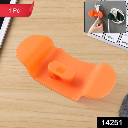 Wall-mounted Wukusy plug holder hook for home improvement, featuring a sturdy design for organizing plugs and cables.
